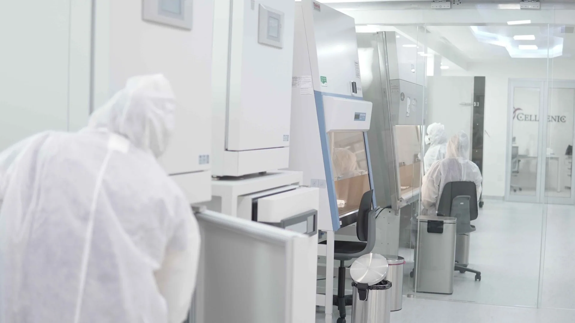 Technicians working inside the Cellgenic cGMP laboratory